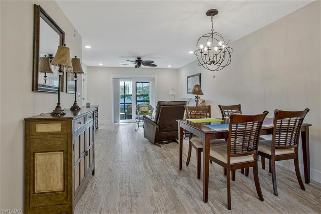 Easy care floors throughout  Great room with dining and living rooms areas