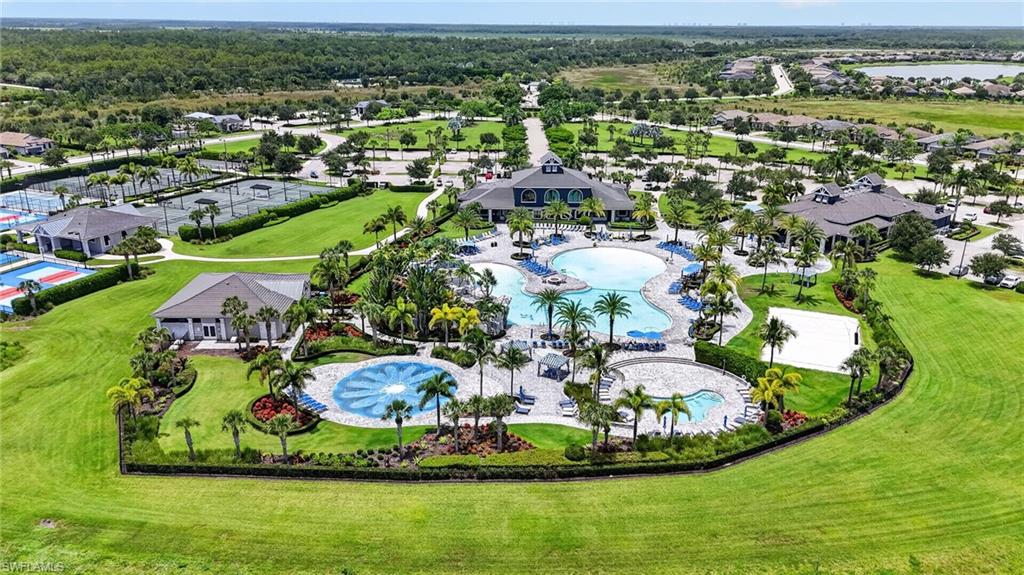 Expansive community amenities including multiple pools, tennis courts, and recreational buildings