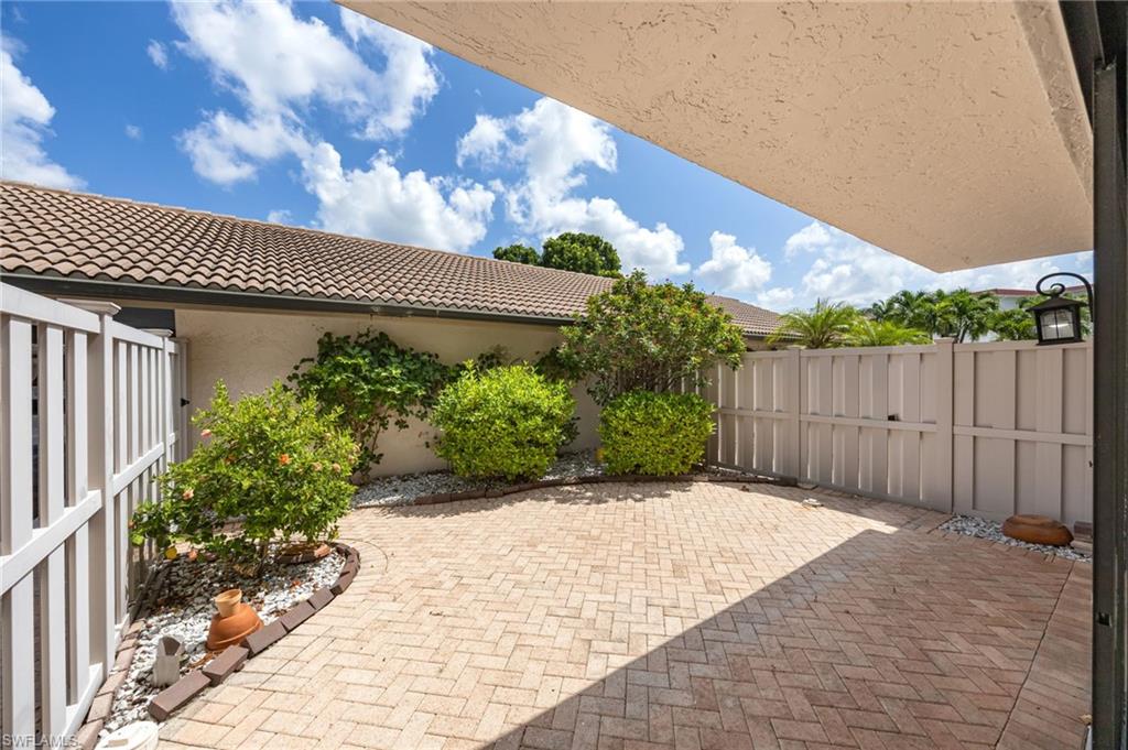 Another view of the private garden courtyard that is accessible from sliding doors in the kitchen and the second bedroom.