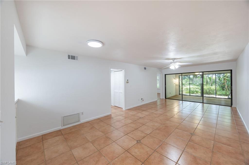 Open living and dining area that connects to all season room.