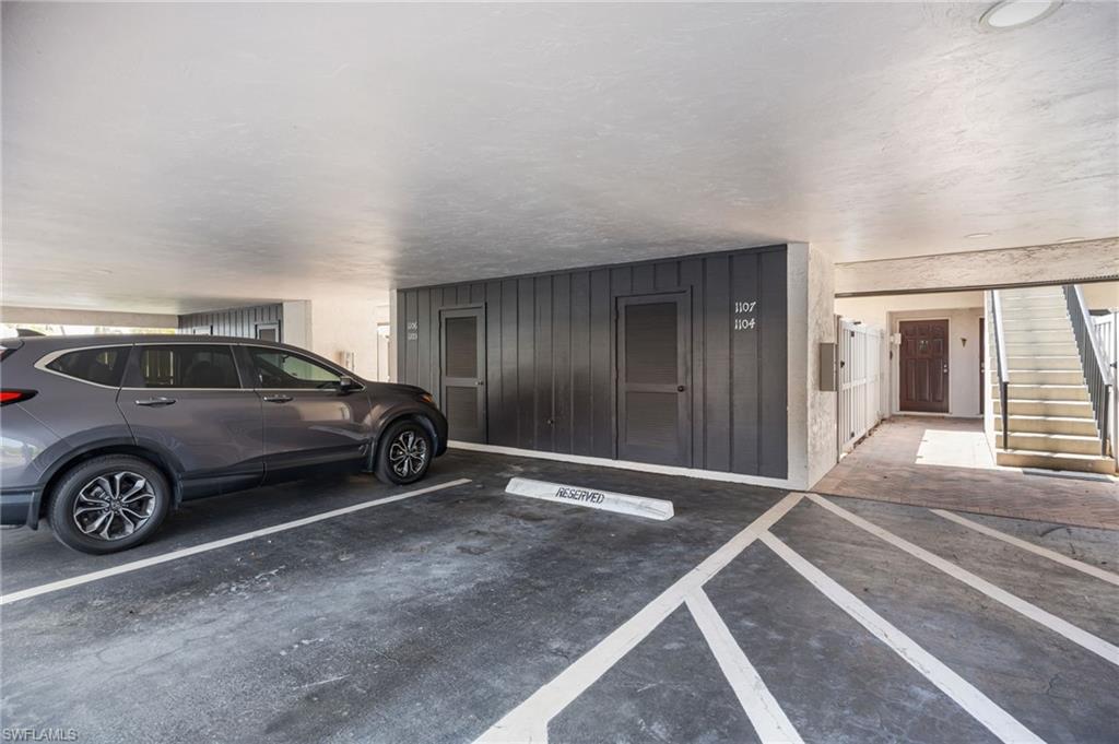 Covered Carport Parking just steps to the first floor front door.  A secure, spacious exterior storage closet is directly in front of the parking space.