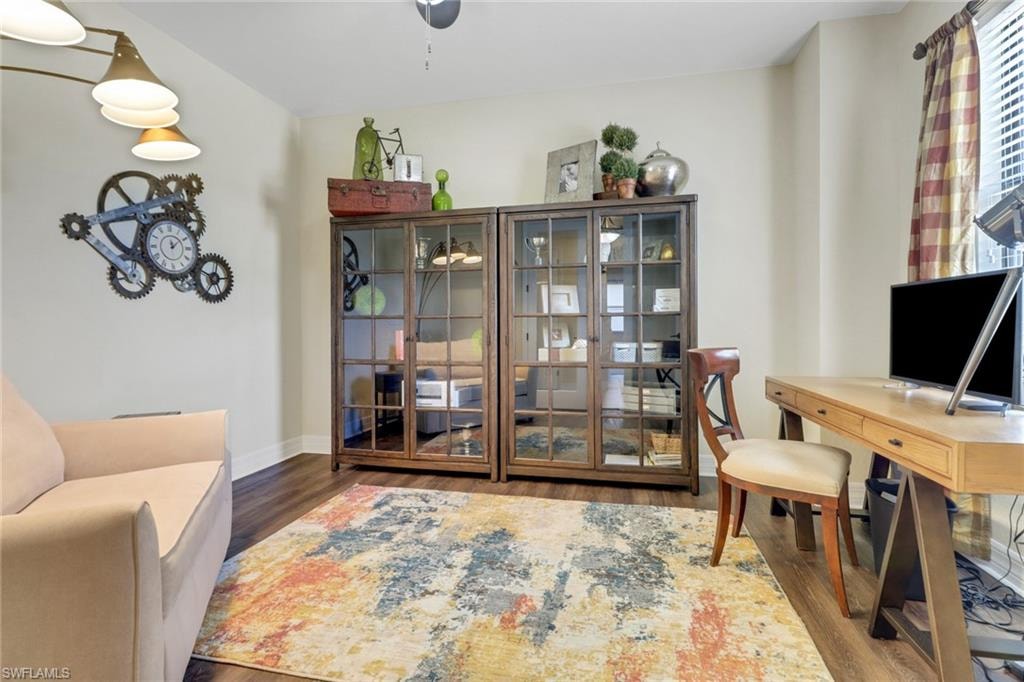 Office area featuring wood finished floors and baseboards
