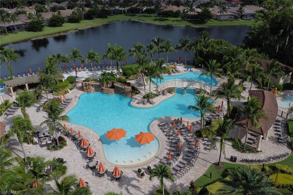 Community pool with a water view