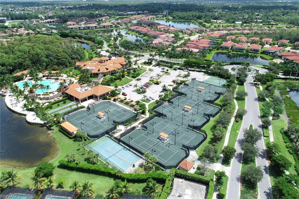 Aerial overview of property's location featuring a large body of water and nearby suburban area