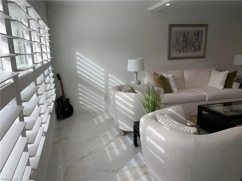 Great Room with Plantation Shutters!!