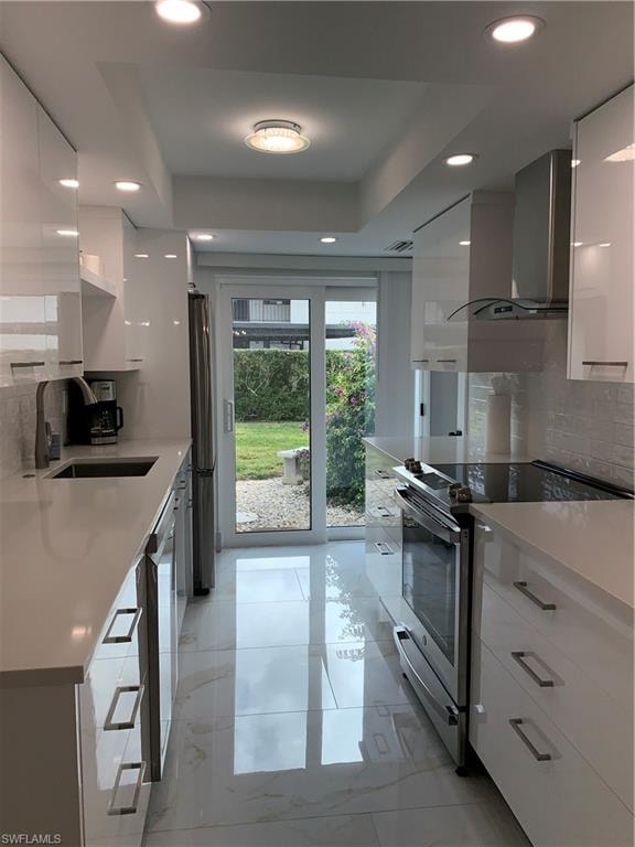 The glass slider at end of kitchen leads out to side yard!
