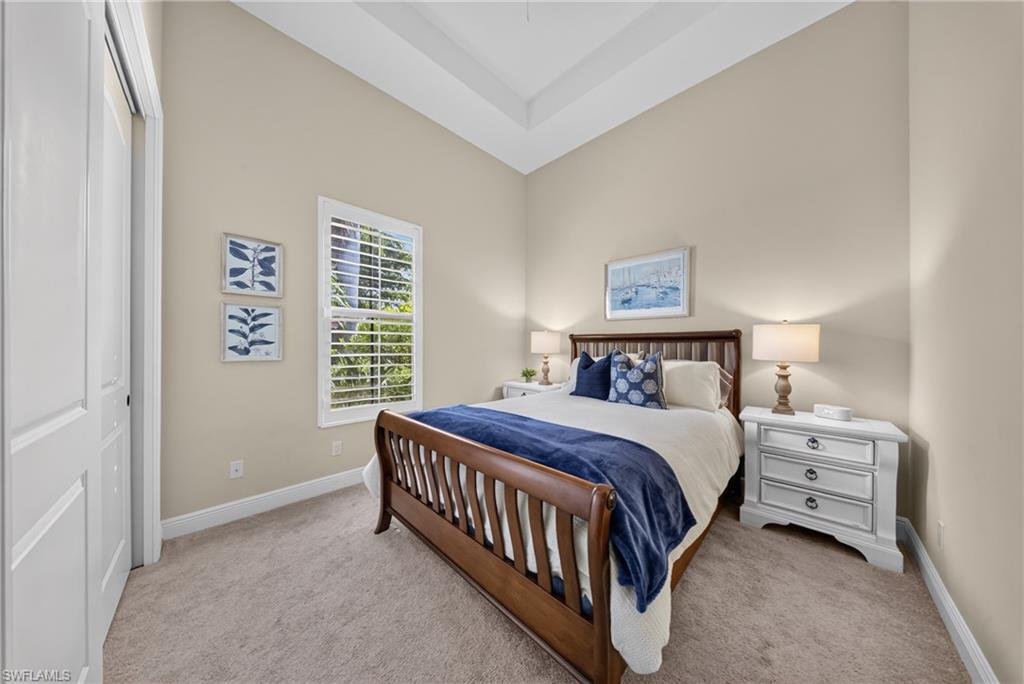Recessed tray ceiling over a carpeted interior space