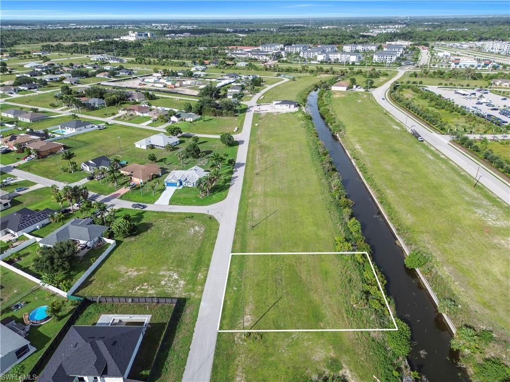 Expansive undeveloped lot featuring clear land for building