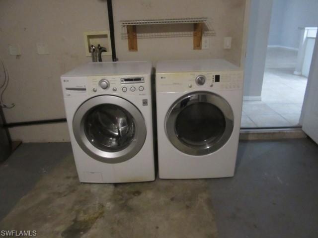 Laundry area featuring a concrete floor, utility sink connections, and an elevated storage shelf