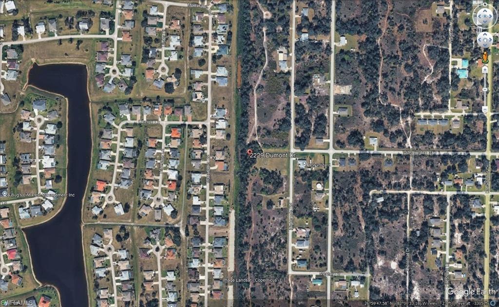 Aerial View. Illustrating the property's location relative to surrounding land parcels and infrastructure