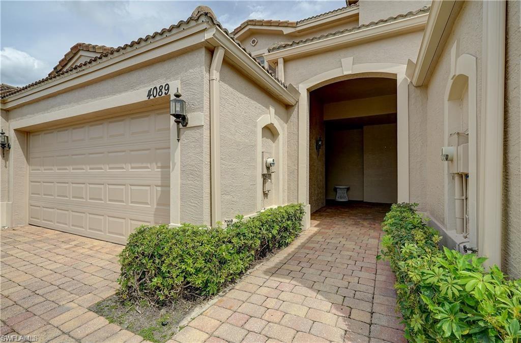 Entrance to property with a garage