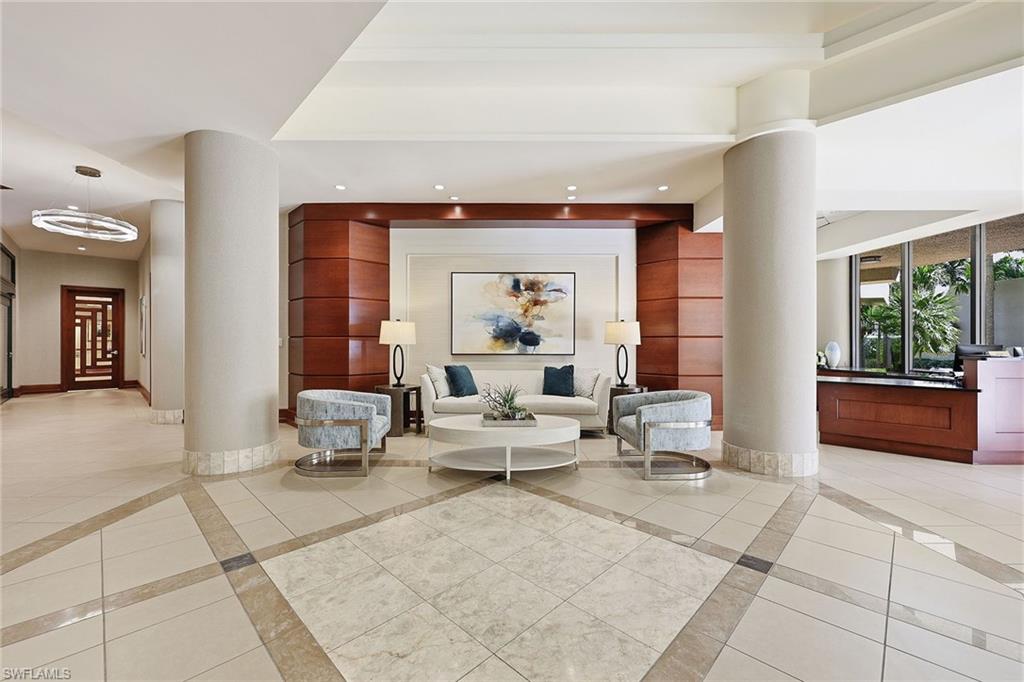 Concierge at reception. Lobby area.