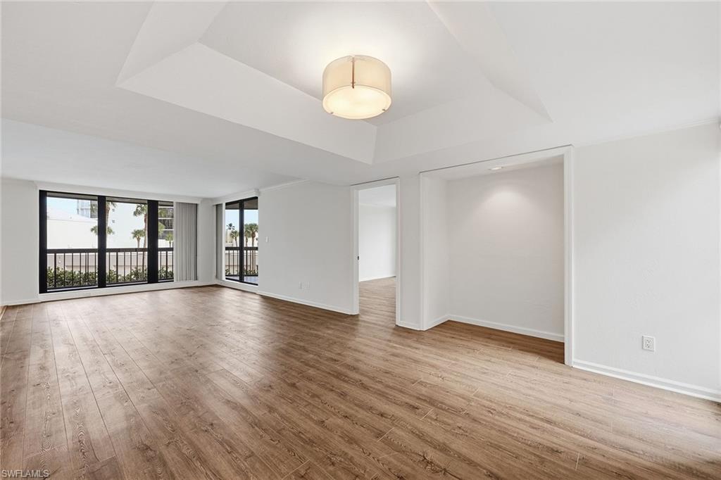 Living room looking out to balcony. with bump out for tv, desk, bar...your choice.