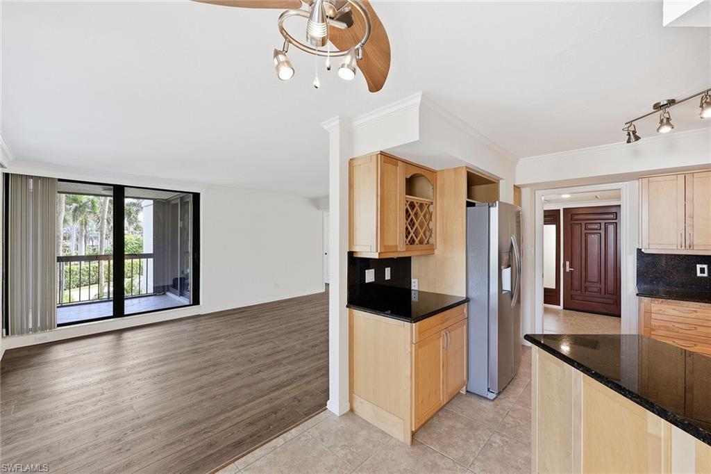 Kitchen from dining room into living room