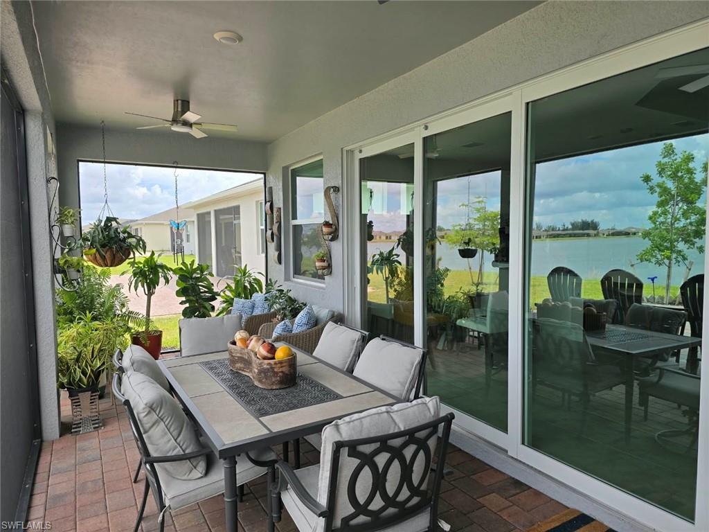 Screened-in patio with brick-finish flooring