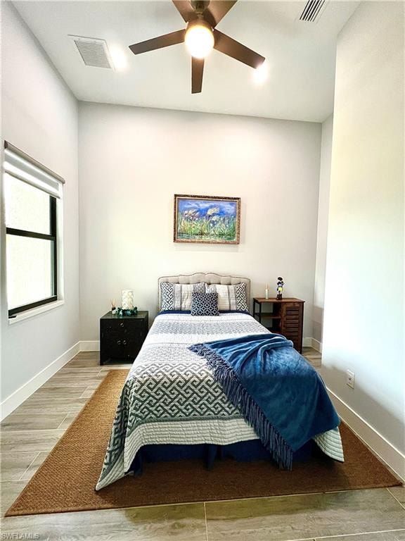Room with high ceilings and light-toned walls