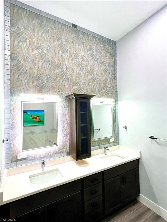 Double vanity with integrated sinks and white countertops