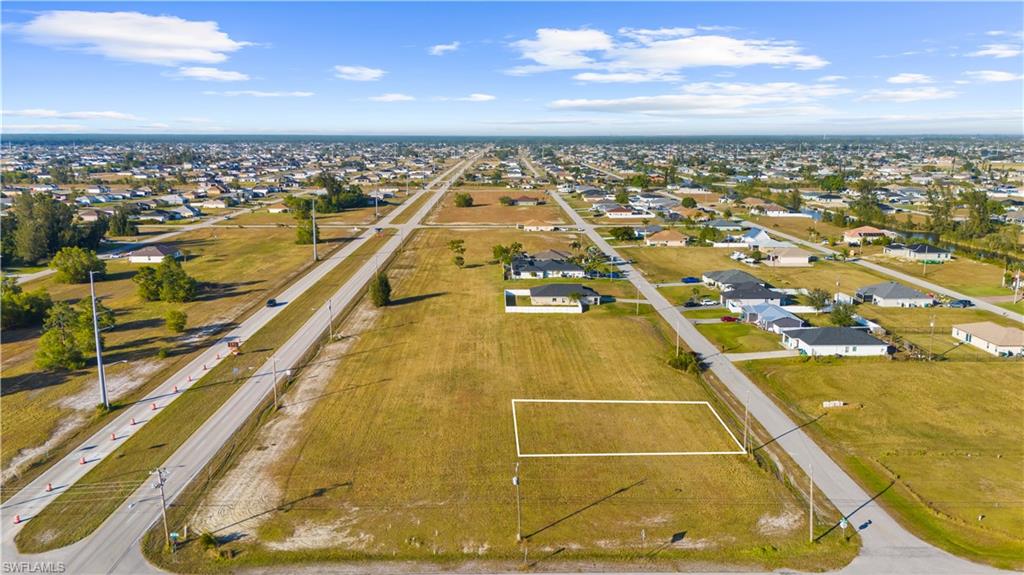 Expansive land parcel featuring direct road frontage
