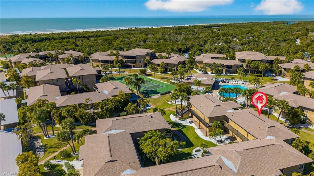 Aerial view of residential area with a nearby body of water