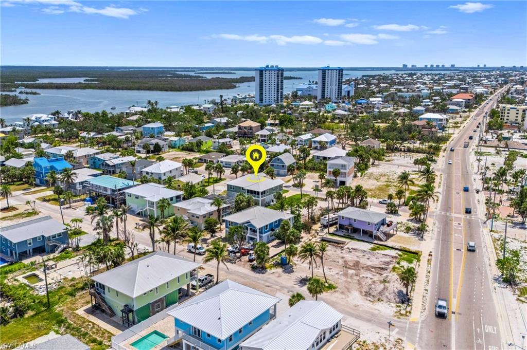 Bird's eye view with a water view and a view of city - VIRTUAL EDITED EXTERIOR IMAGE