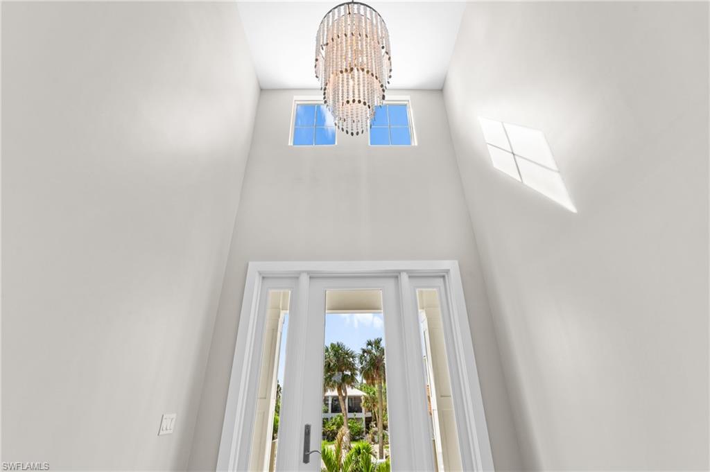 Room details with a chandelier. virtually edited photo