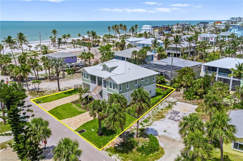 Let's Walk to the Beach! -Birds eye view of property featuring a water view - VIRTUAL EDITED EXTERIOR IMAGE