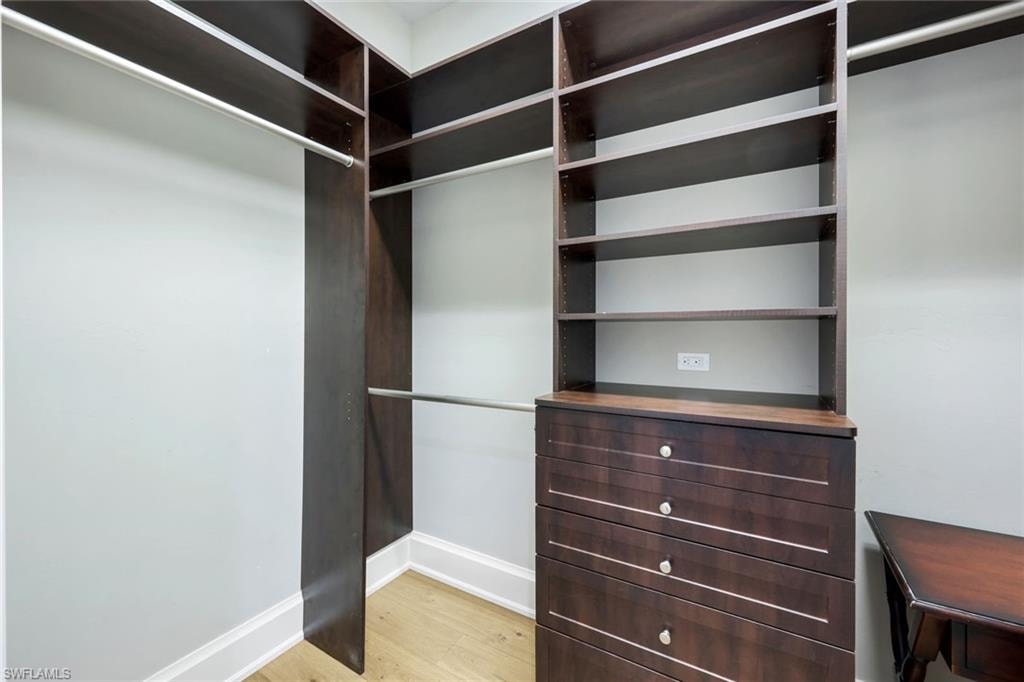 1 of 2 built out closets in primary