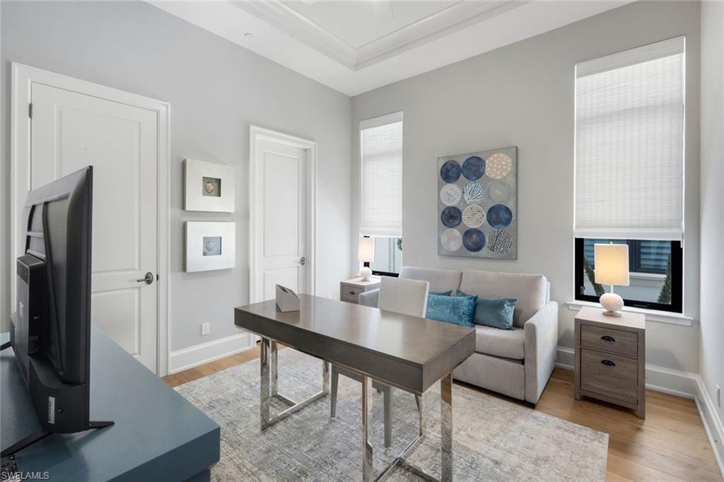 3rd bedroom set up as an office with a pullout couch