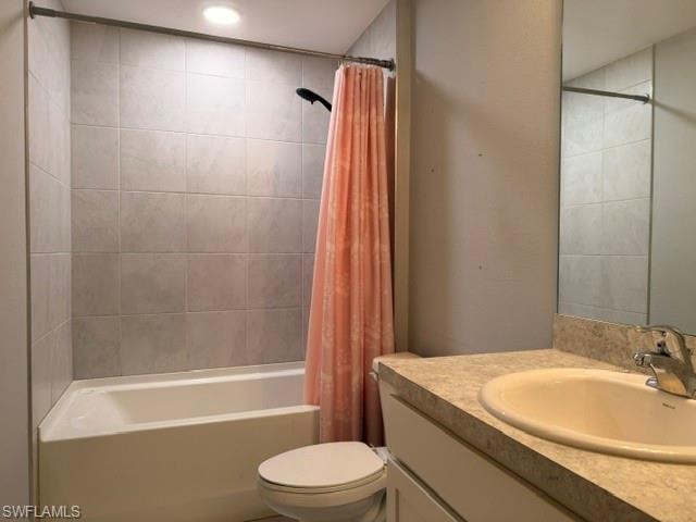 Bathroom featuring a bathtub with tiled surround, shower fixture, and recessed lighting