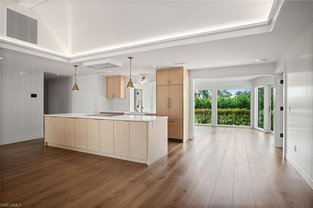 Open kitchen & living space with stunning greenery views from every window.