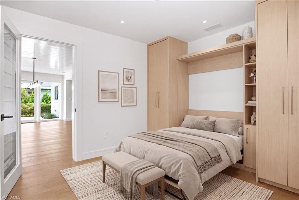This stunning residence offers 2 BEDROOMS + DEN (EASILY USED AS A THIRD BEDROOM), 2 BATHROOMS. Photo virtually staged to show furniture possibility.