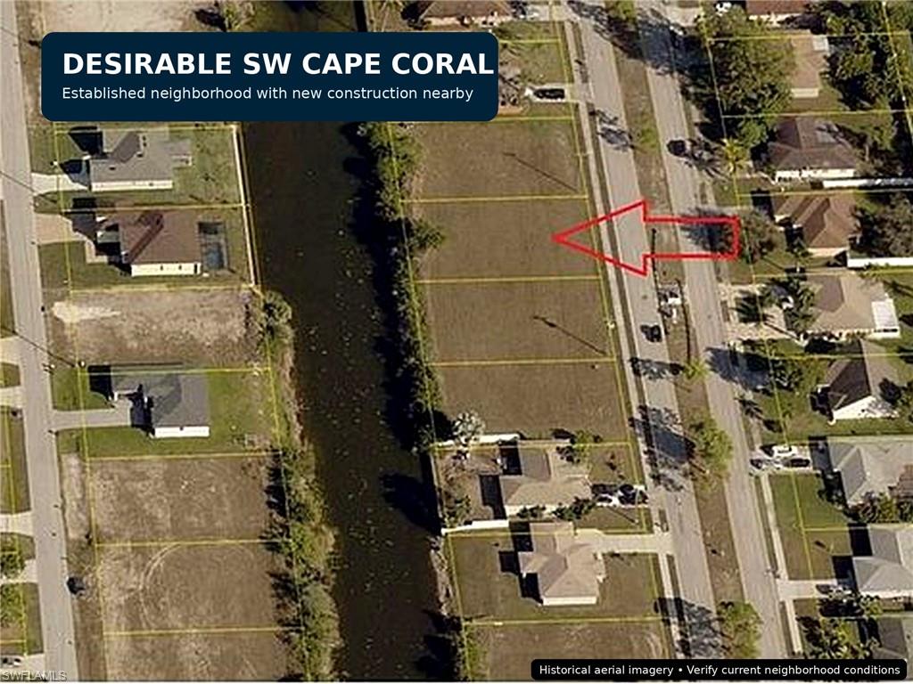 Aerial Imagery. Displaying a specific plot within a developed area of Cape Coral, indicating surrounding construction activity
