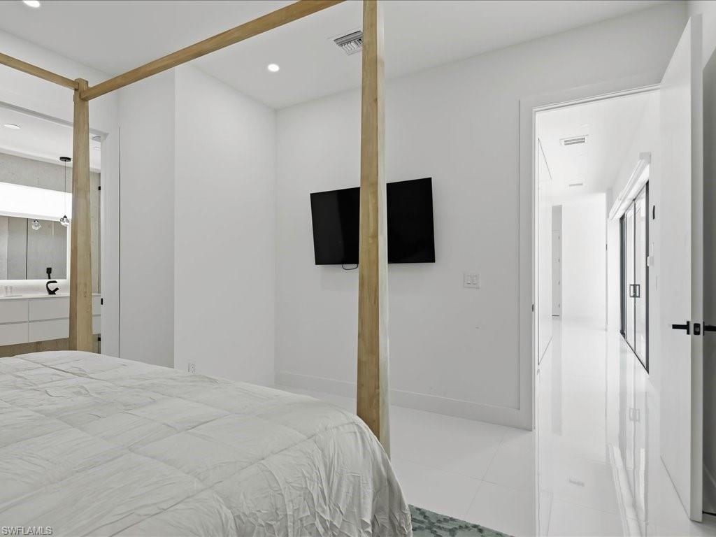 White-walled interior space with recessed lighting