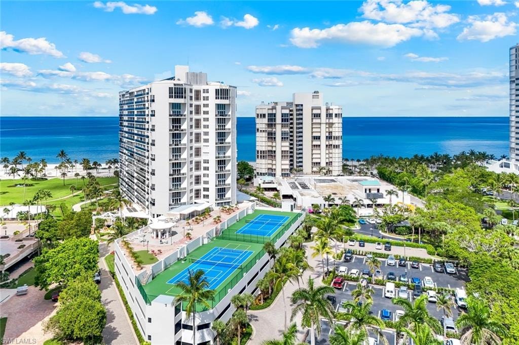 Bird's eye view of a large body of water and apartment complex / building