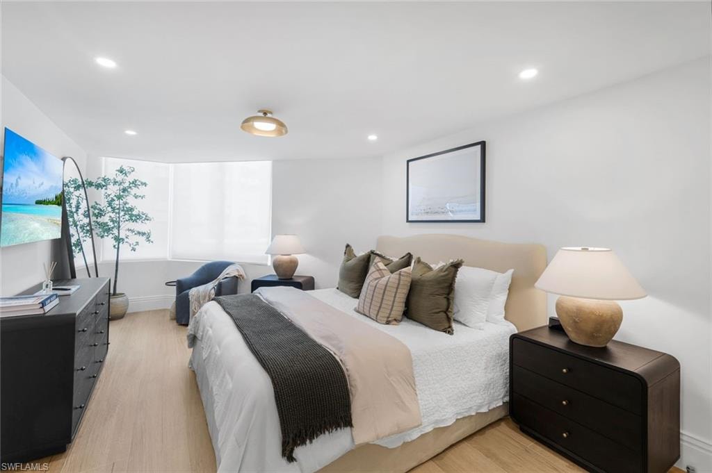Bedroom featuring light wood-style floors and recessed lighting