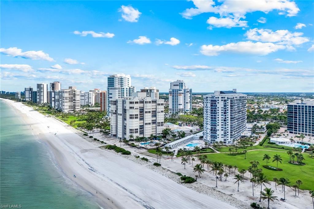 Aerial view of city skyline and expansive beach