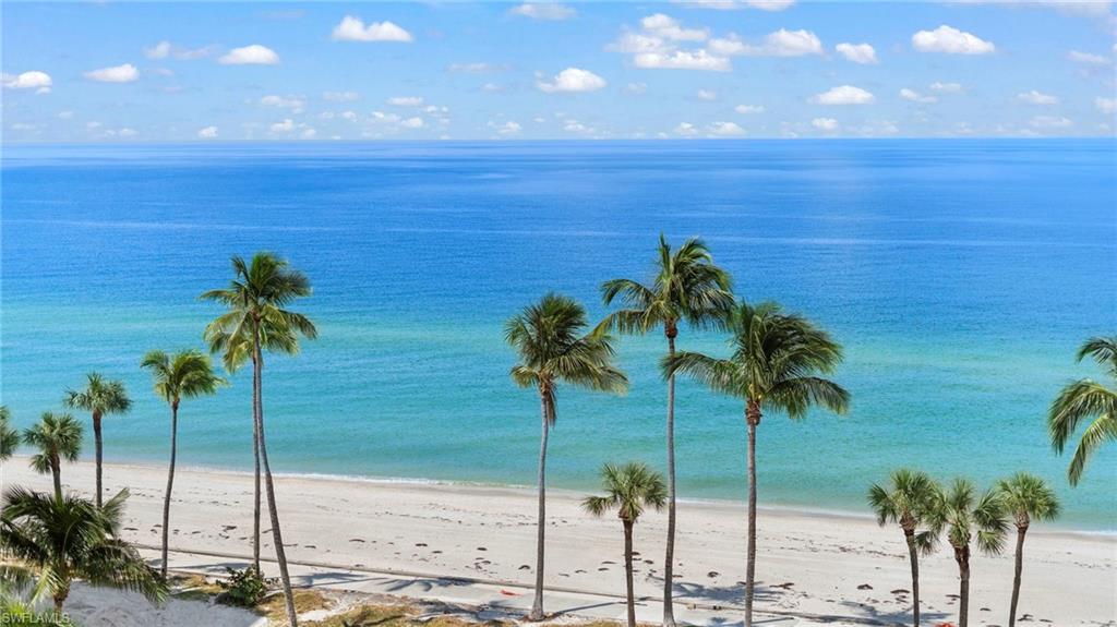 Property view of water featuring a beach view