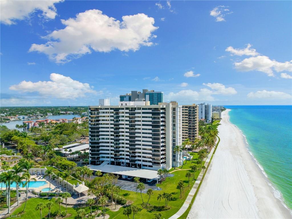 Drone / aerial view featuring a view of the beach and a water view
