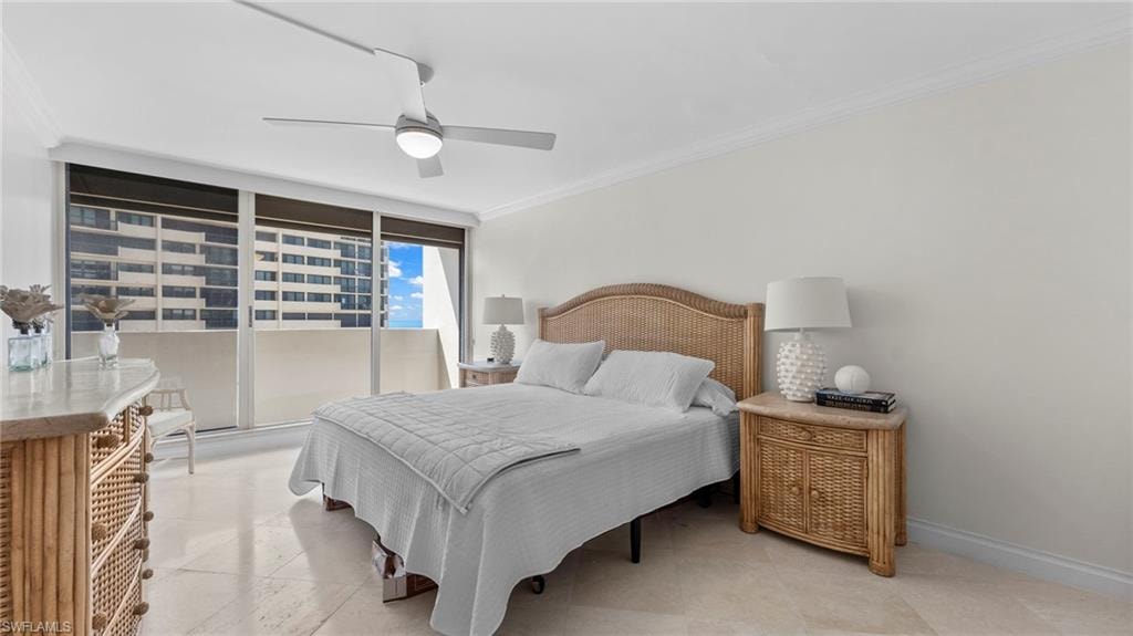 Bedroom featuring floor to ceiling windows, ceiling fan, and crown molding