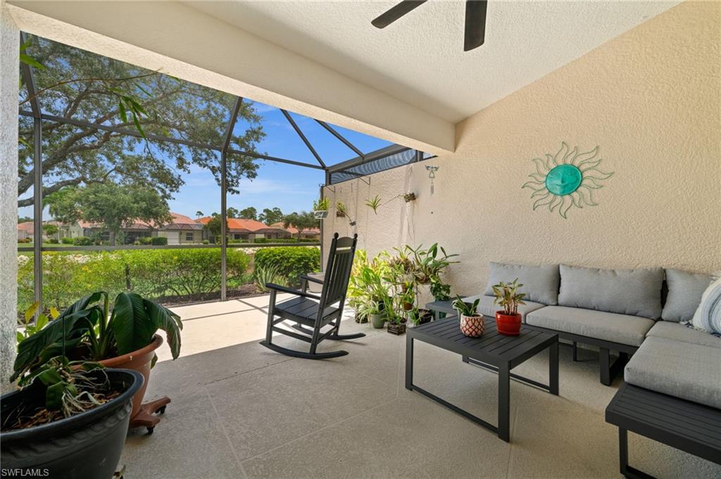 The screened lanai sits right above the water, shaded and comfortable when the day turns warm.