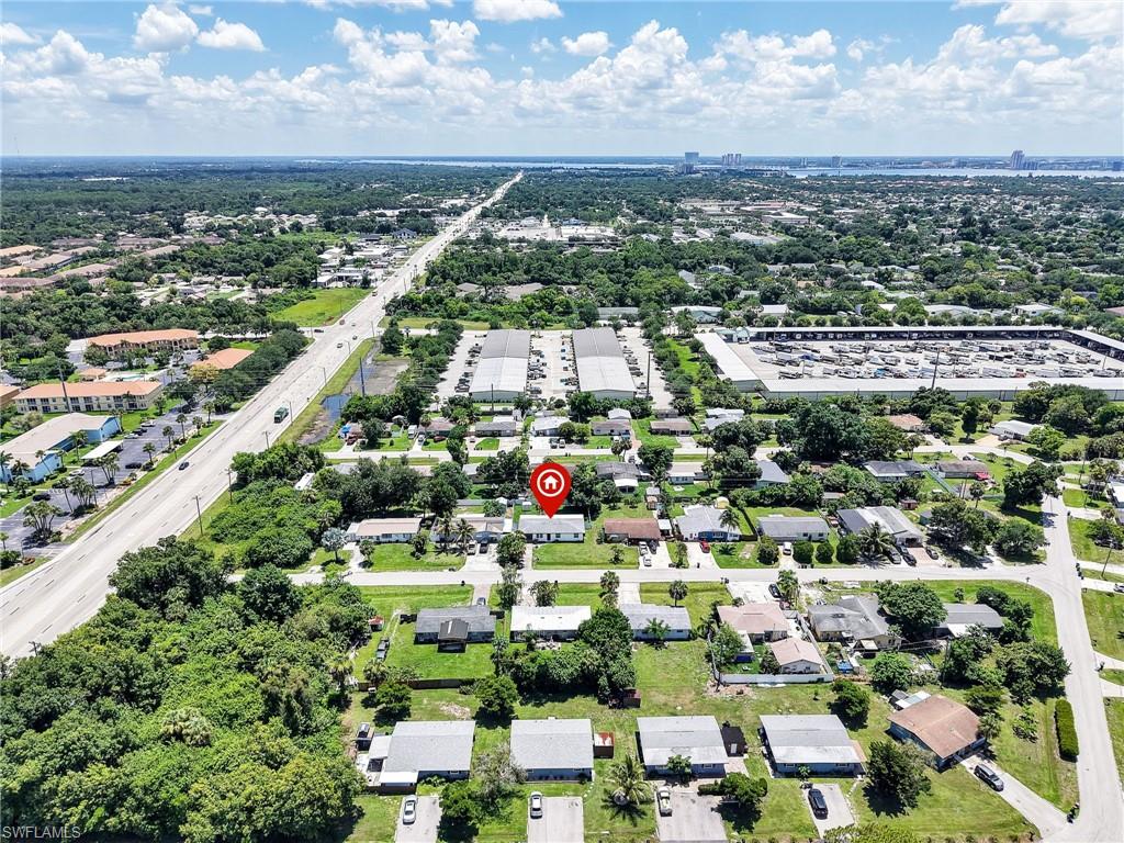 Aerial perspective showcasing a residential property within a broader community
