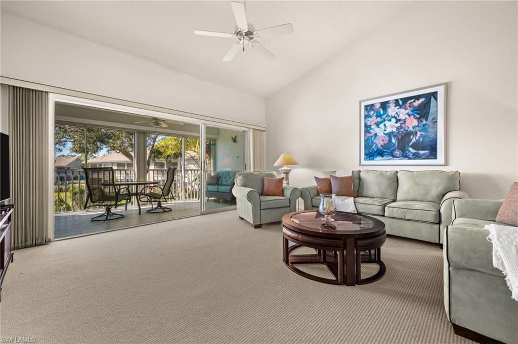 Seamless flow from the living room to the expansive screened lanai.