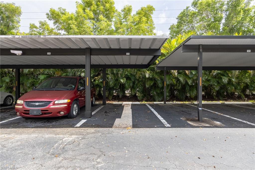 Covered parking structure with multiple spaces
