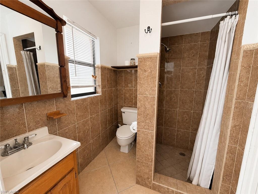 Guest Bathroom #1 (Walk-Out Door to Pool)