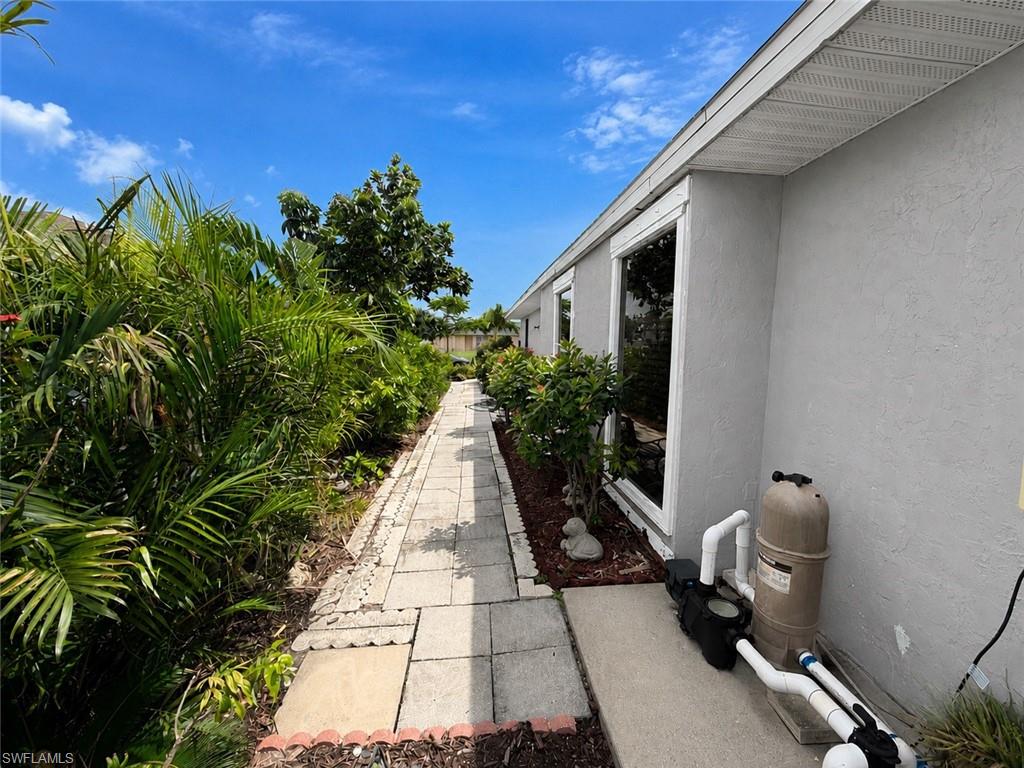 Right Side of Home - Showing Herbs/Fruits and garden area