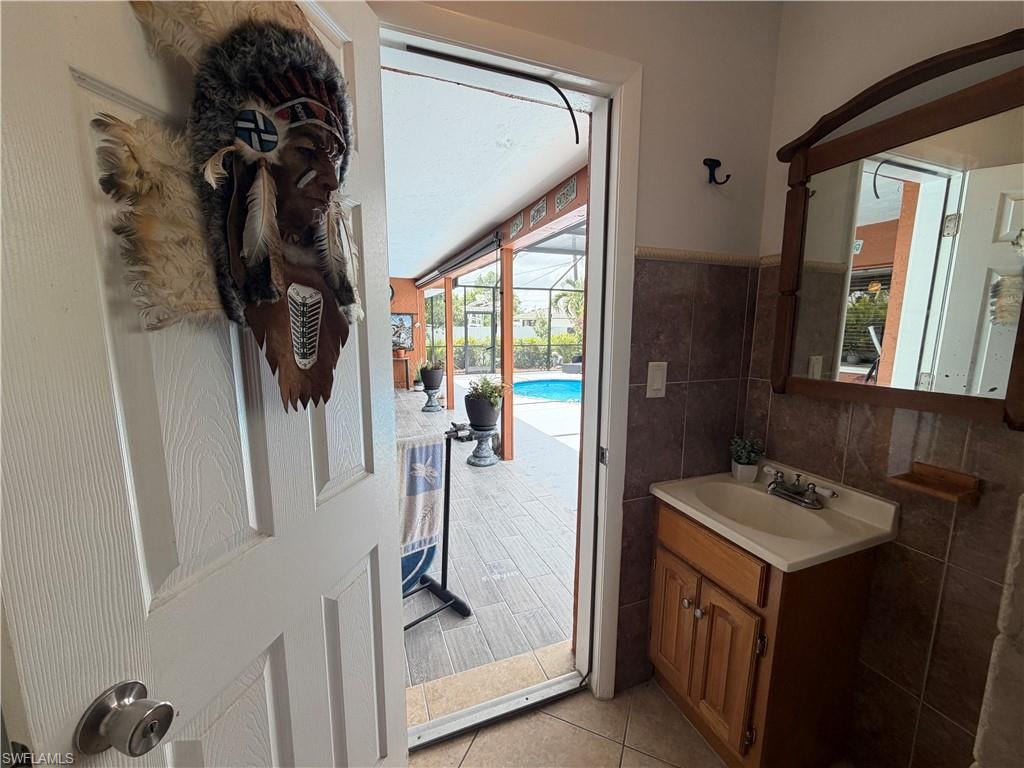 Guest Bathroom #1 - showing walk-out to pool area