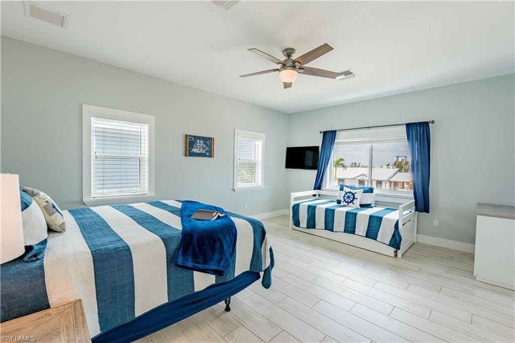 Bright interior space featuring light wood-finish flooring - Virtually Edited Image