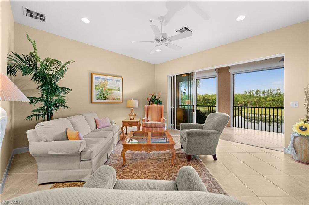 Living Room with Full Wall Sliders to Lanai