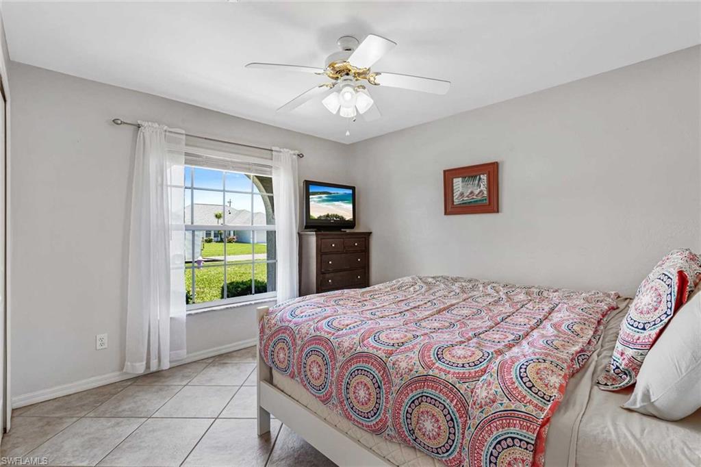 Guest bedroom #1 has a King bed & flat-screen TV