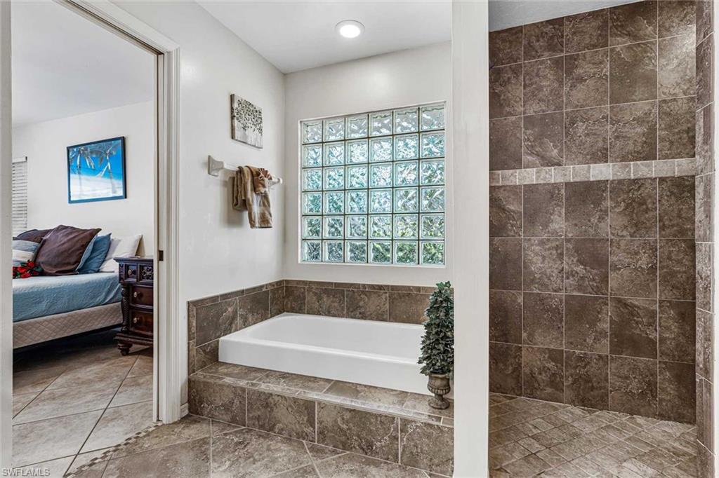 The primary bathroom also has a soaking tub & shower
